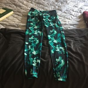 Green and black athletic leggings